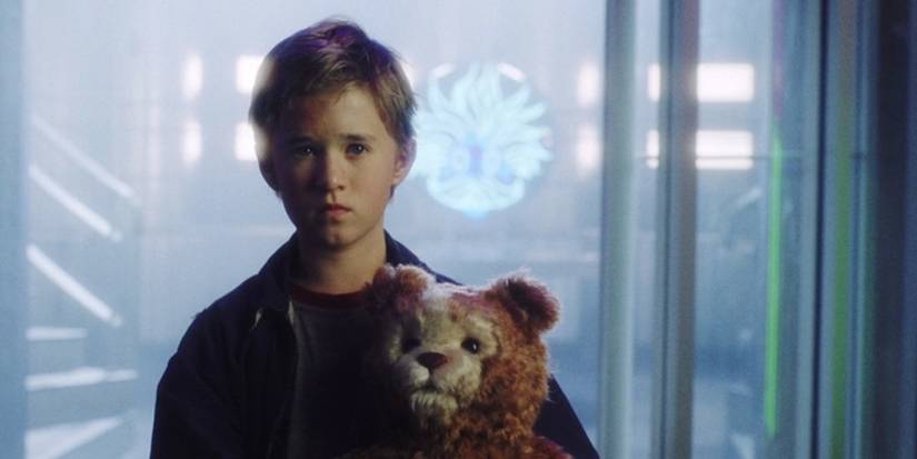 Haley Joel Osment as David holding his teddy bear in A.I. Artificial Intelligence