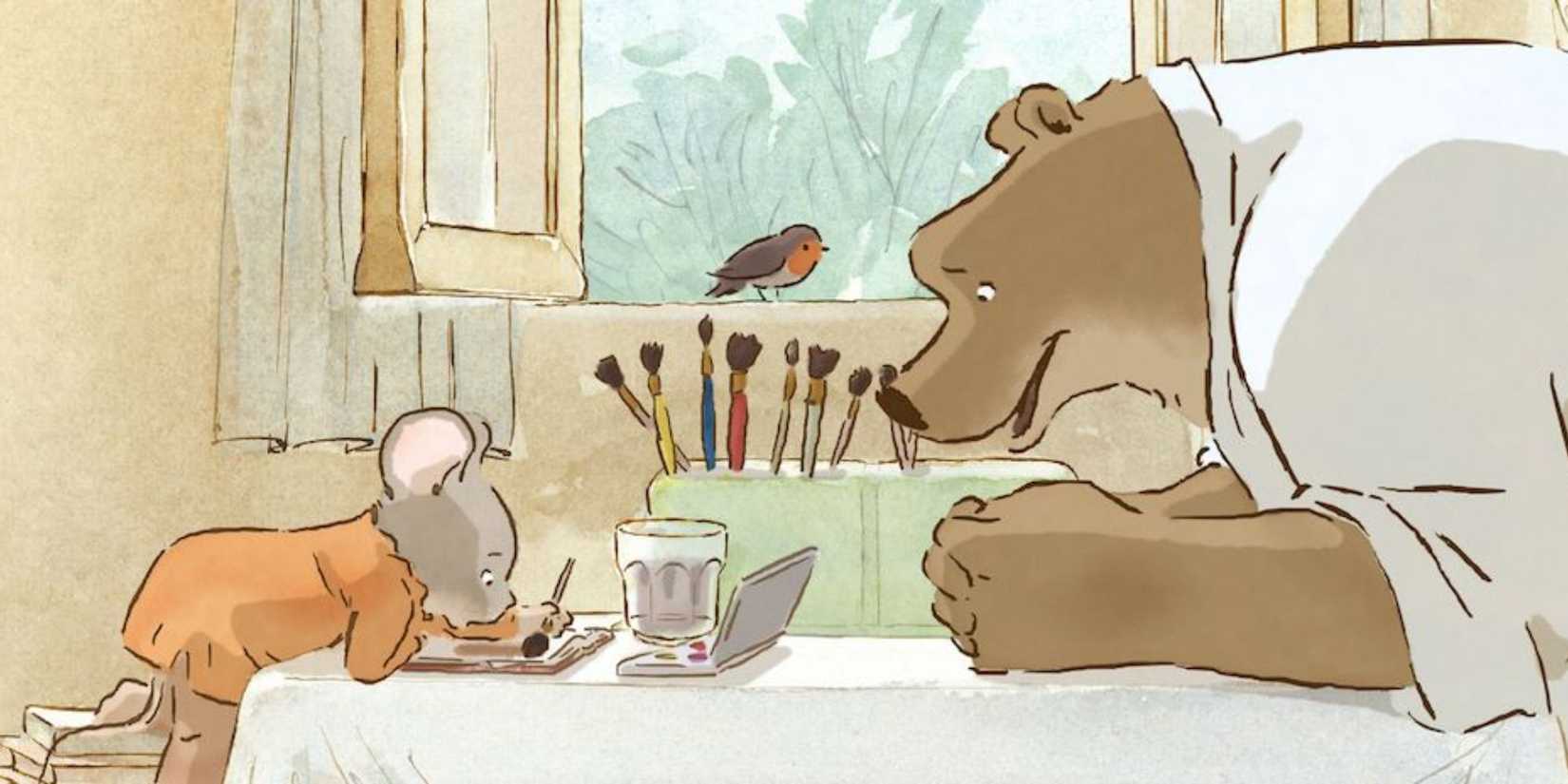 Ernest the bear watching the little mouse Celestine painting in 'Ernest & Celestine'