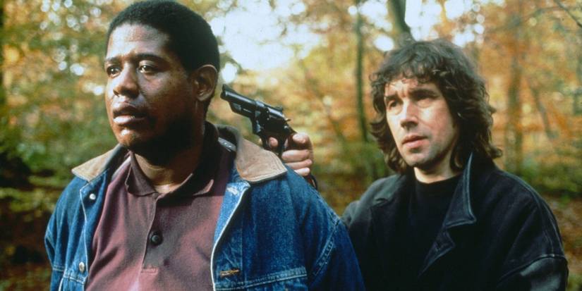 Jude pinting a gun at Jodie in the woods in the film in The Crying Game.