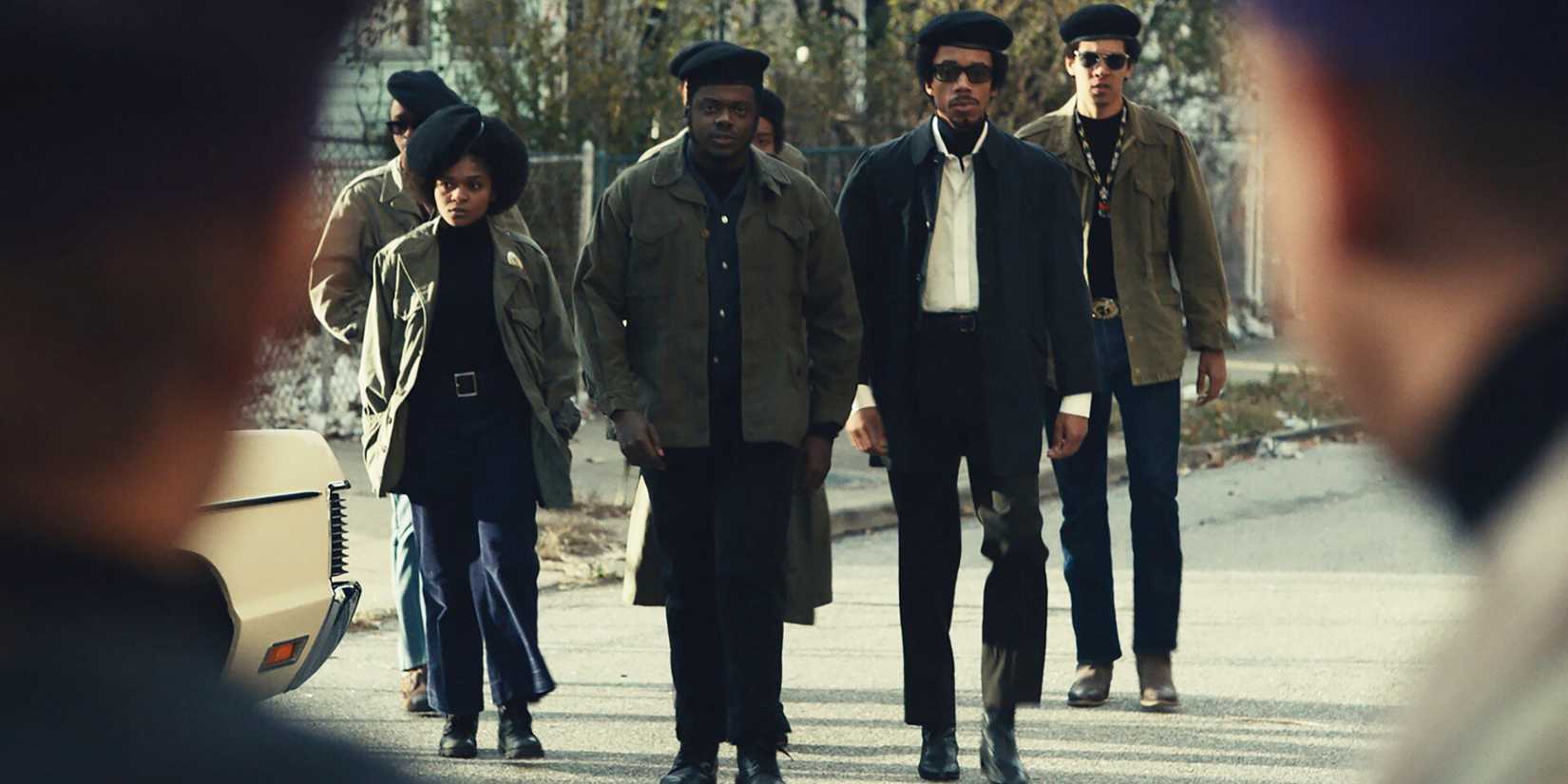 Several Black men walking ahead in Judas and the Black Messiah - 2021