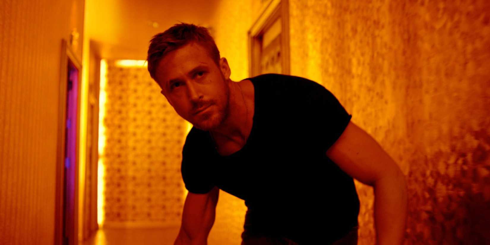 Ryan Gosling walking down a hallway in 'Only God Forgives'