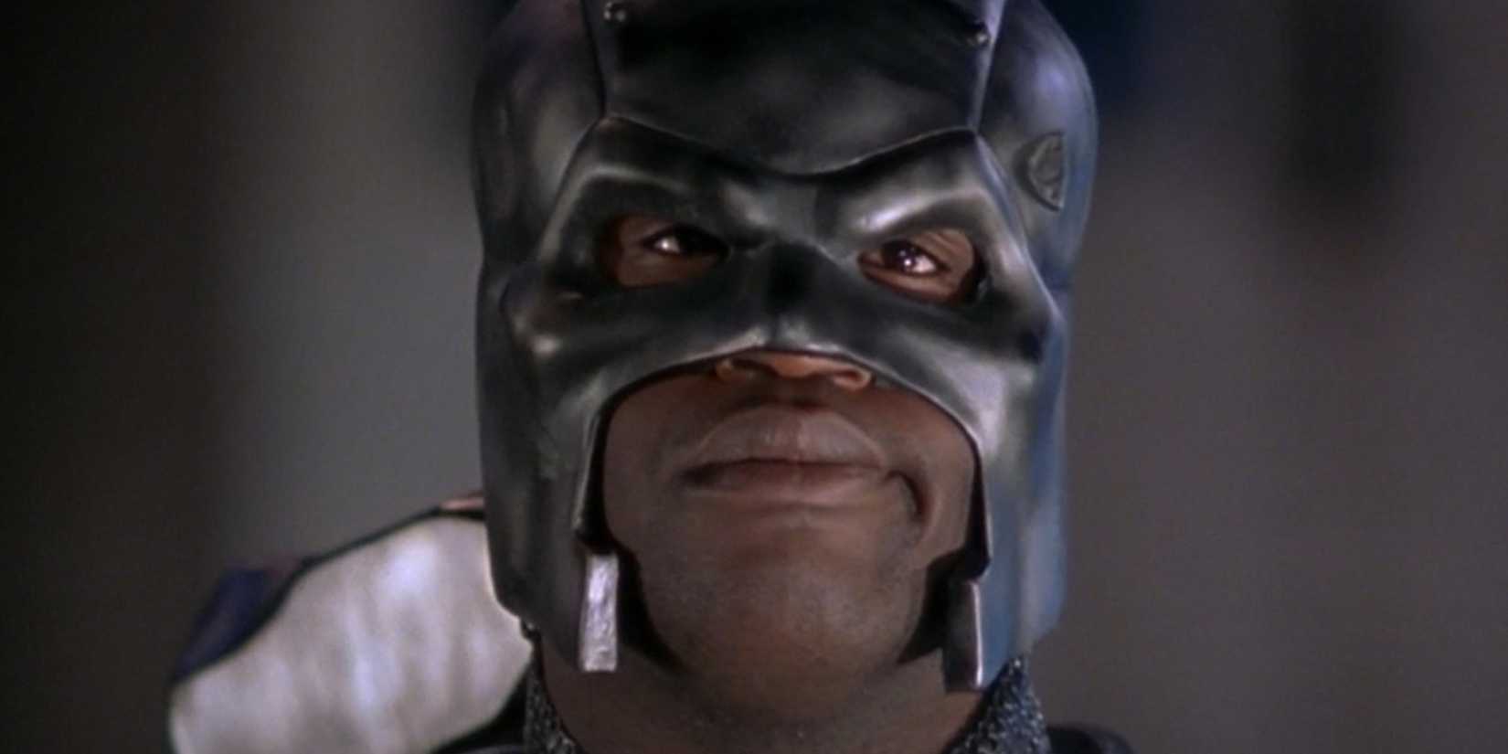 Shaquille O'Neal with a steel mask, looking at the camera in Steel