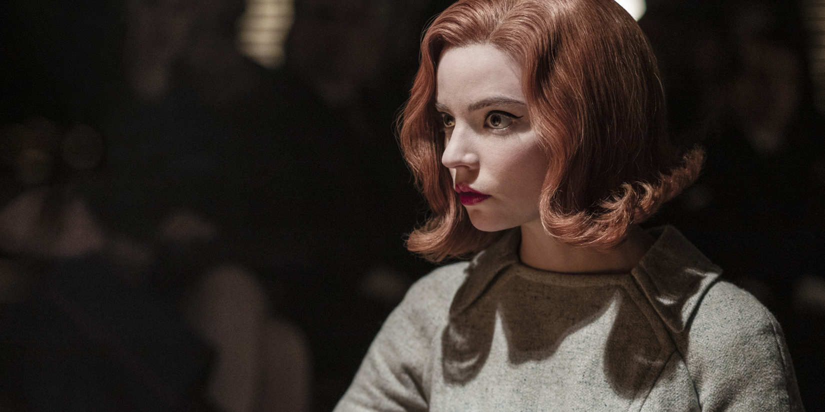 Anya Taylor-Joy as Beth Harmon looking intently in 'The Queen's Gambit'.