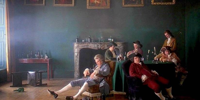 Partygoers lounging around in Barry Lyndon