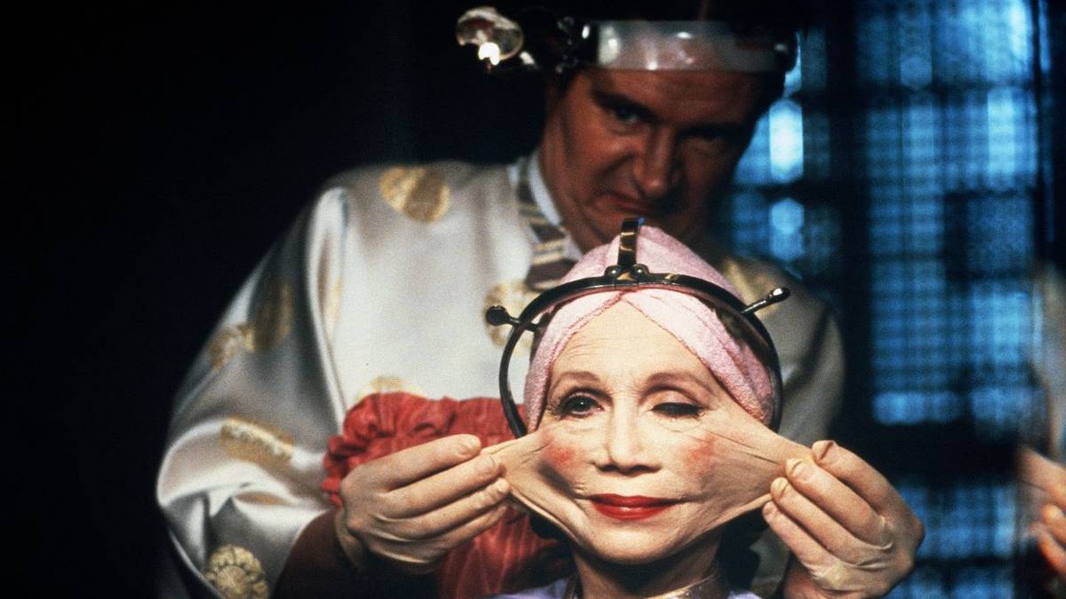 Jim Broadbent stretches Katherine Helmond's face in Brazil
