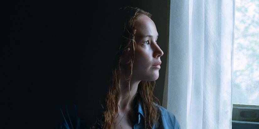 Jennifer Larence as Lynsey looking outside her window in Causeway.