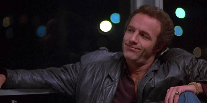 James Caan as Frank sitting by an airport window in Thief (1981).