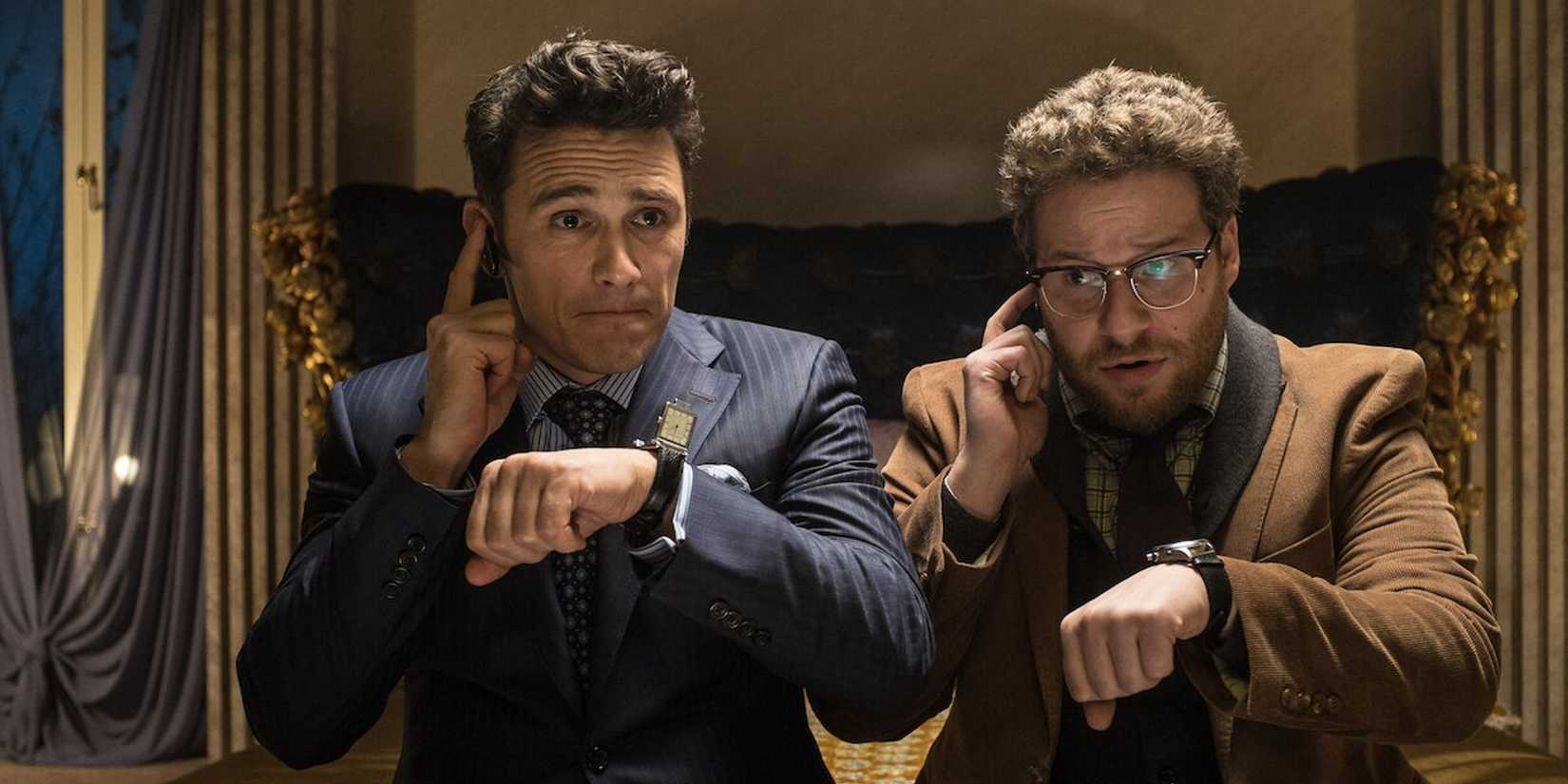 James Franco and Seth Rogen syncing their watches in The Interview