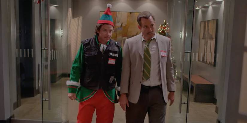Will Arnett and Jason Bateman dressed as an elf in Who Killed Santa, A Murderville Murder Mystery.