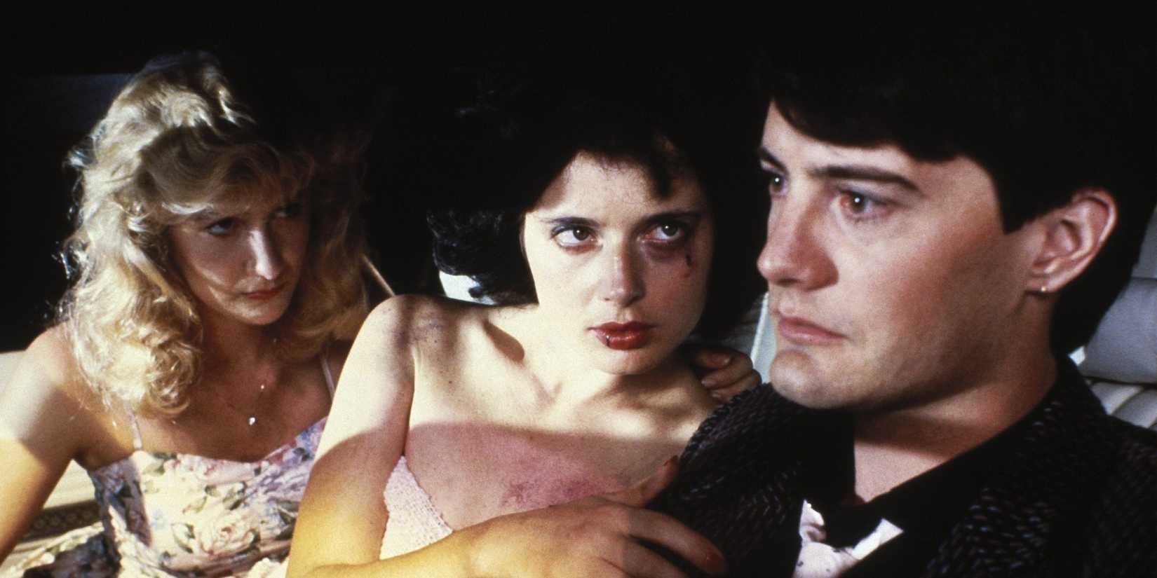 Laura Dern, Isabella Rossellini, and Kyle MacLachlan as Sandy, Dorothy, and Jeffrey in a car together in Blue Velvet