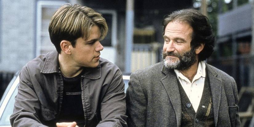 Robin Williams as Sean Maguire and Matt Damon as Will Hunting sitting together in Good Will Hunting
