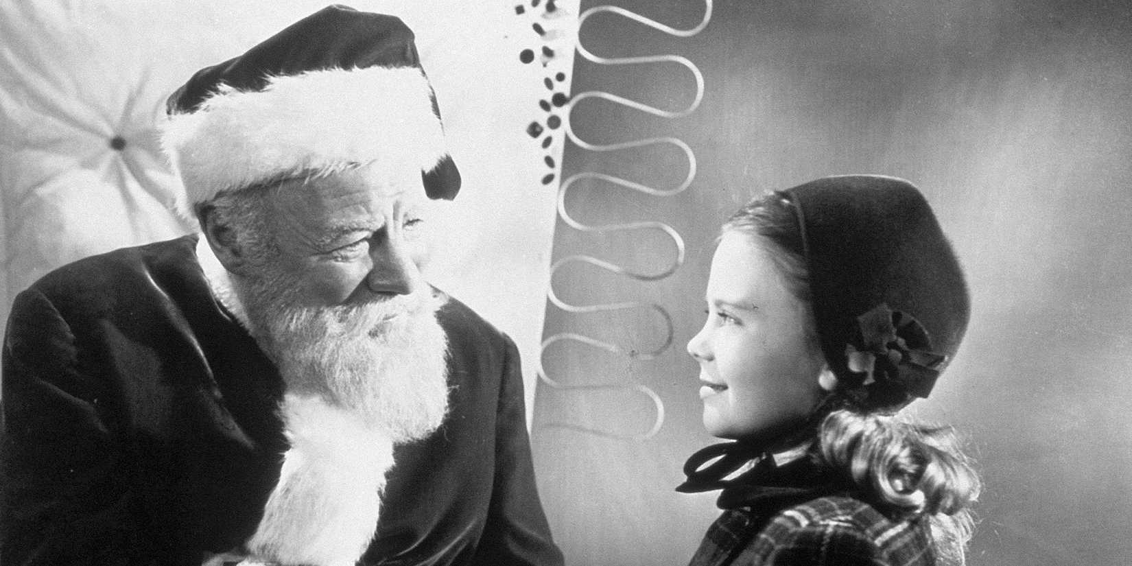 Santa Claus talking to a girl in Miracle on 34th Street 