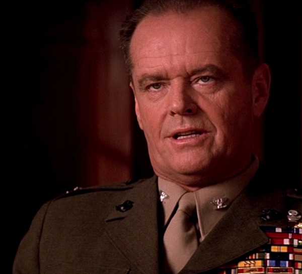 Jack Nicholson as Colonel Nathan R. Jessup in court looking at someone off-camera in A Few Good Men.