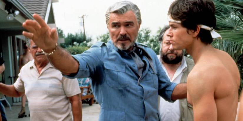 Burt Reynolds as Jack Horner directing Mark Wahlberg as Dirk Diggler in Boogie Nights