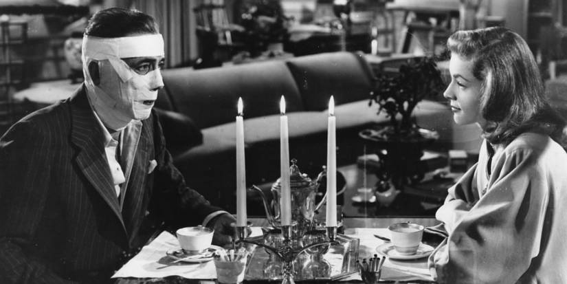 A wounder Vincent with bandages on his face drinking tea with Irene in Dark Passage