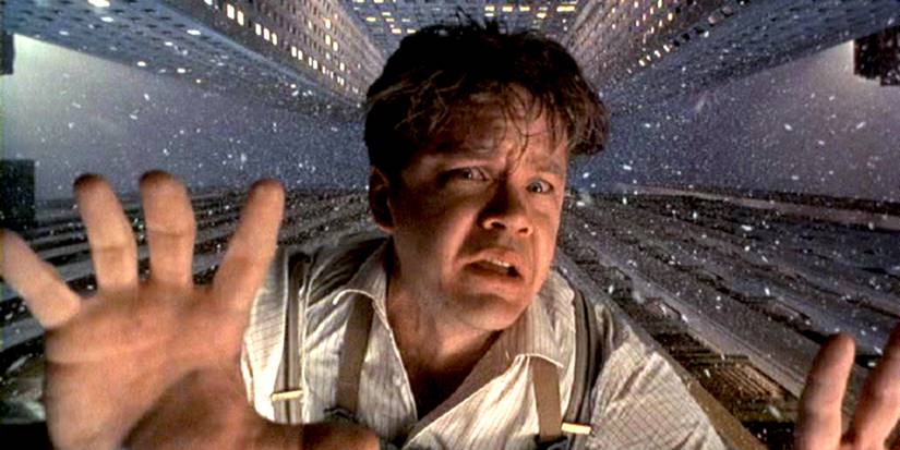 Tim Robbins as Norville Barnes falling in The Hudsucker Proxy.