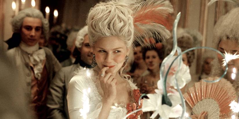 Kirsten Dunst as Marie Antoinette smiling flirtatiously in 'Marie Antoinette'