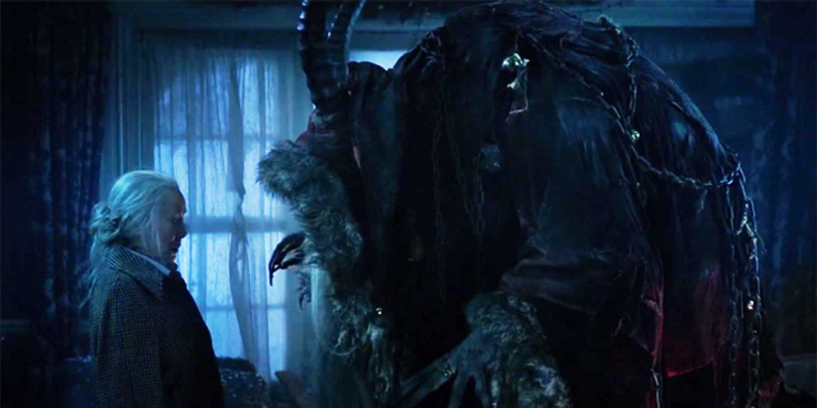 Krampus facing a girl in Krampus 2015