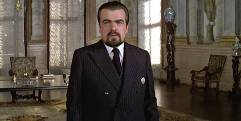 Hugo Drax standing still and looking intently in Moonraker