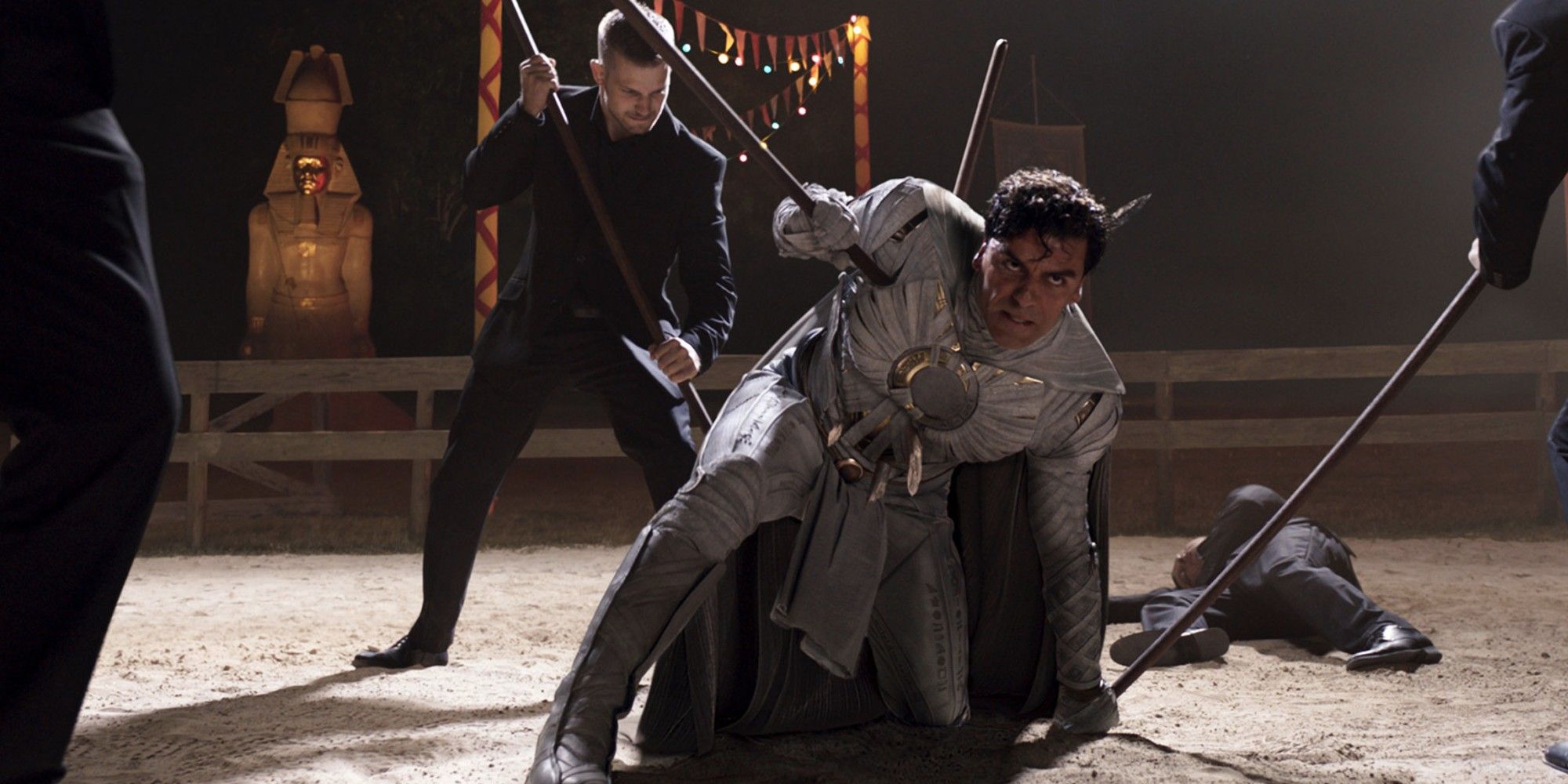 Oscar Isaac getting stabbed with a spear during a fight in 'Moon Knight'