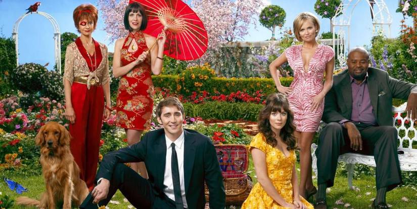 The cast of Pushing Daisies pose for a promotional photo with a lush garden backdrop.