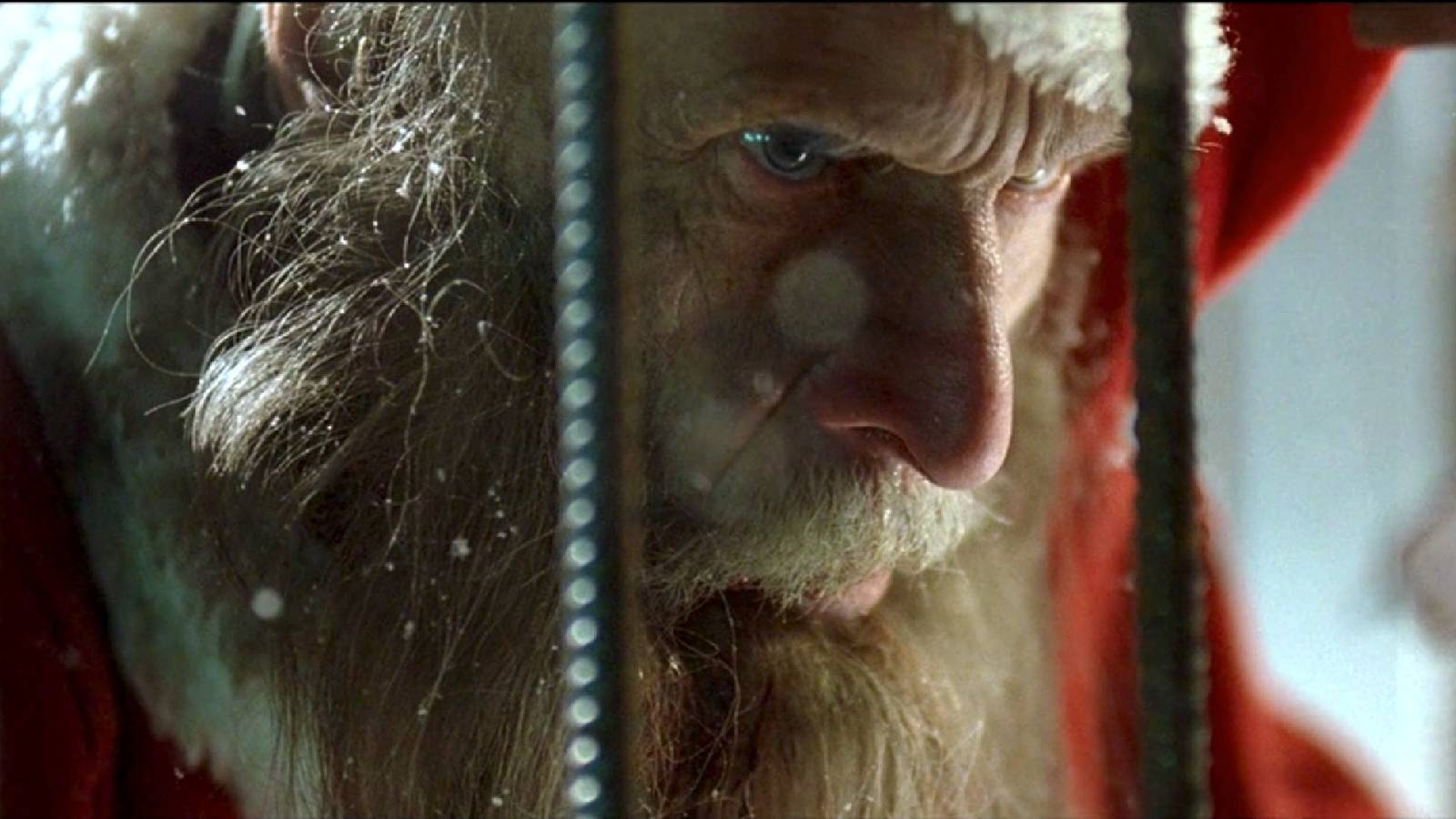 An ancient Santa Claus glares out of a cage in 'Rare Exports'
