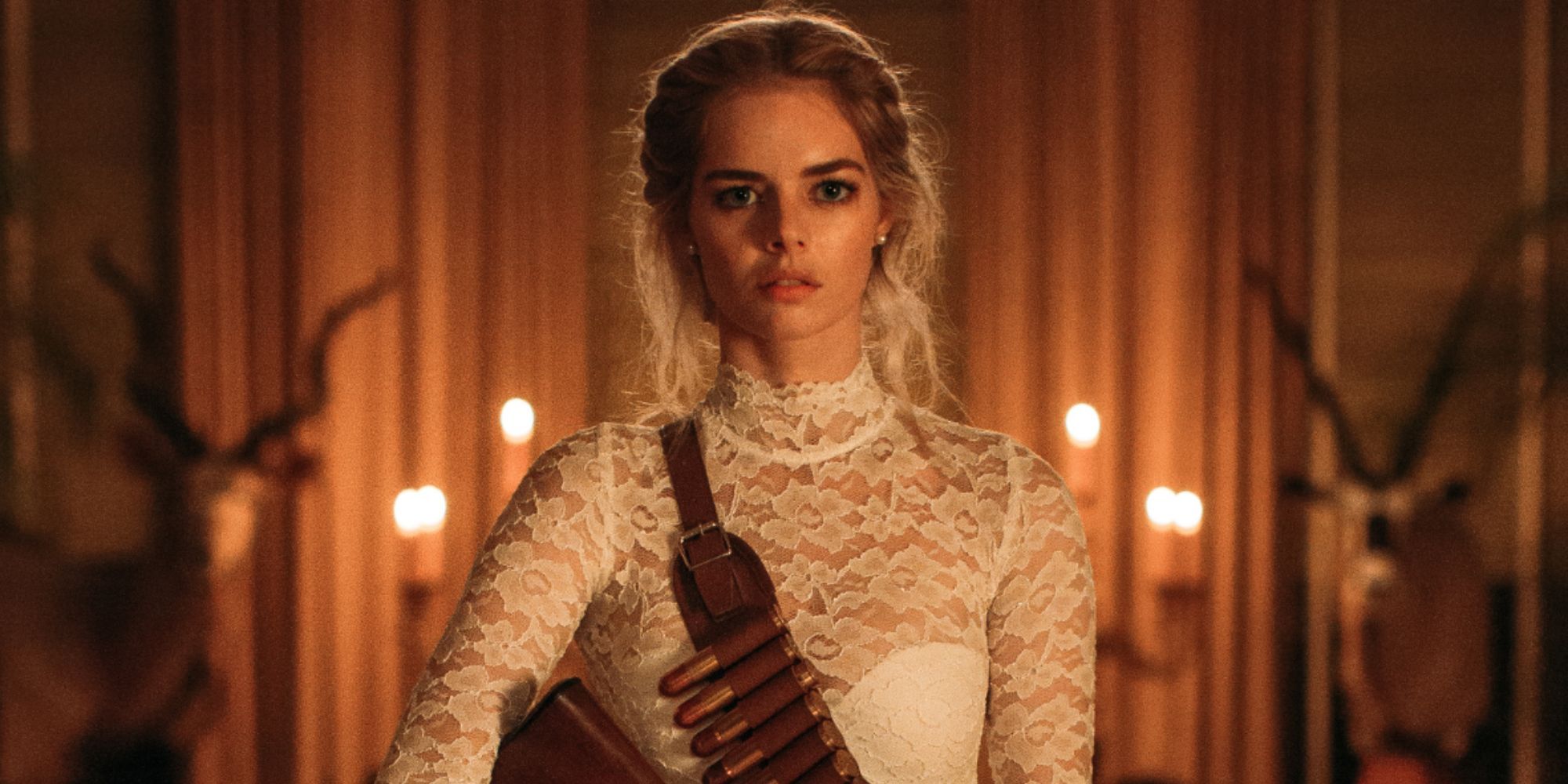 Grace wears a wedding dress and a bullet sash in Ready or Not.