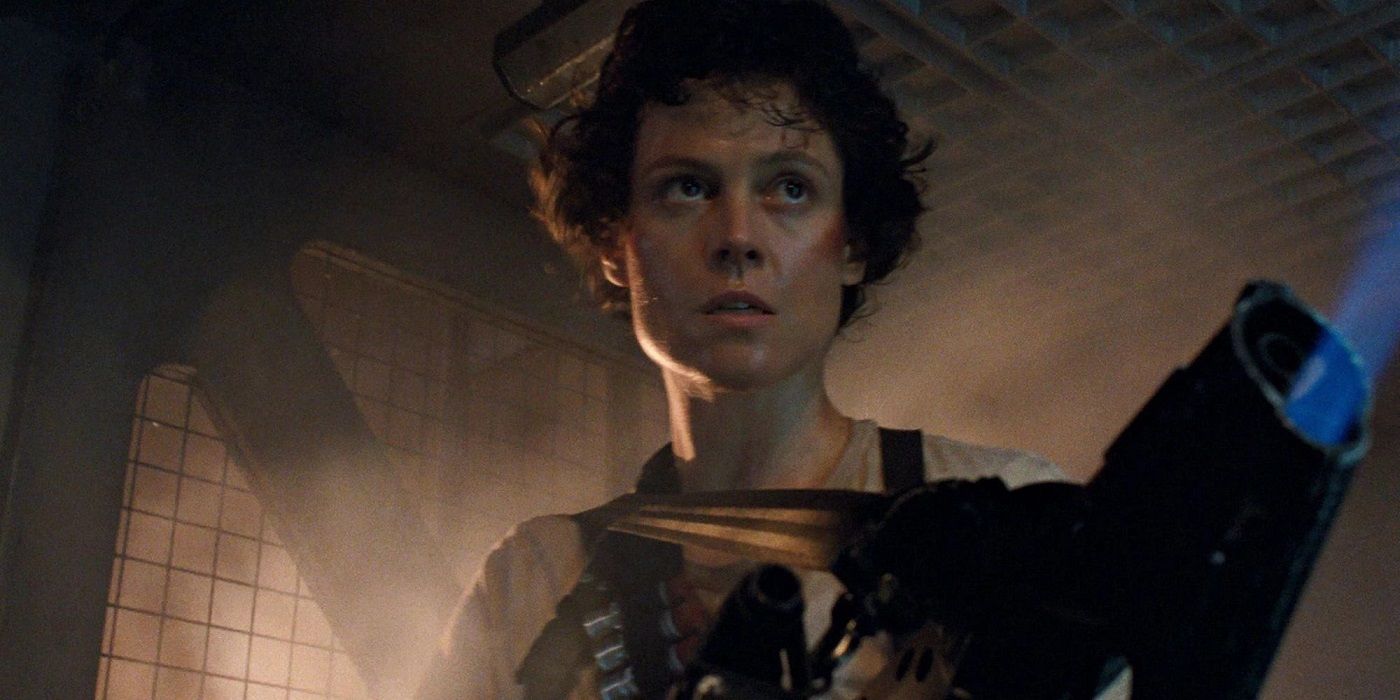 Sigourney Weaver as Ellen Ripley holding a flamethrower in Aliens.