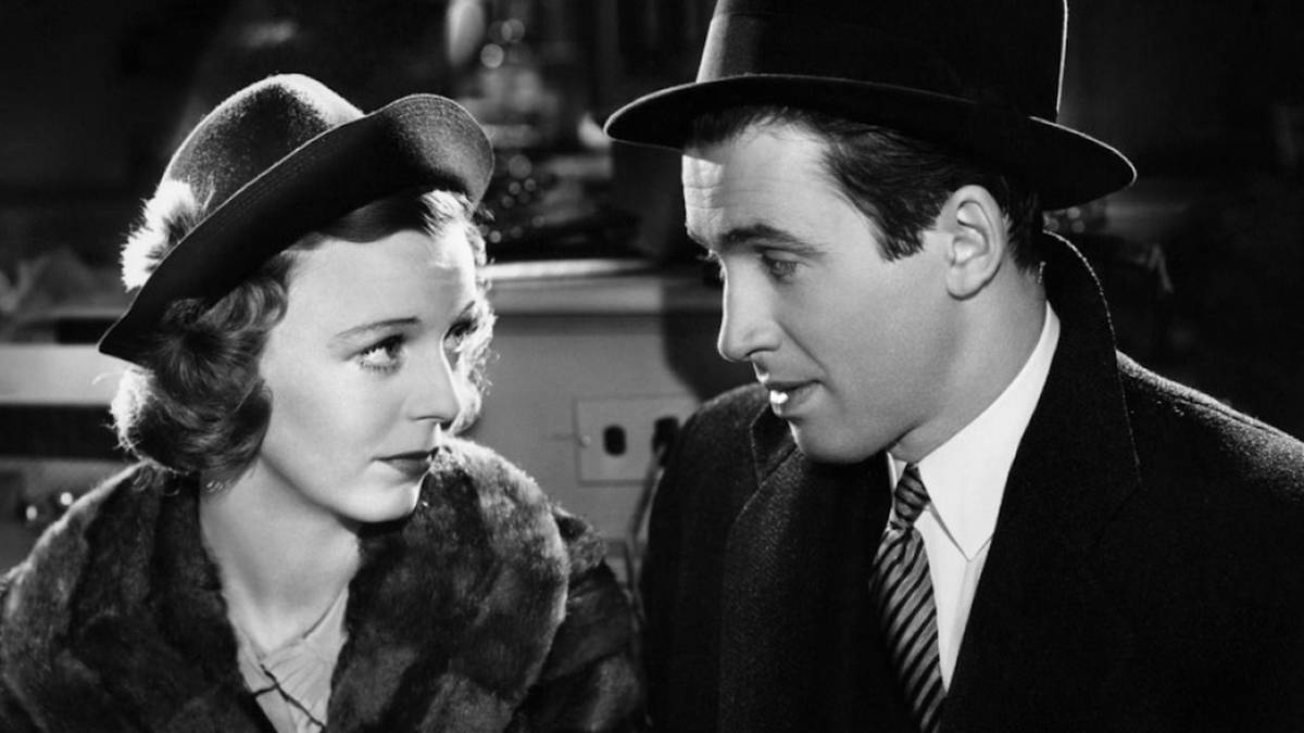 Margaret Sullavan and James Stewart as Klara and Alfred talking in The-shop-around-the-corner