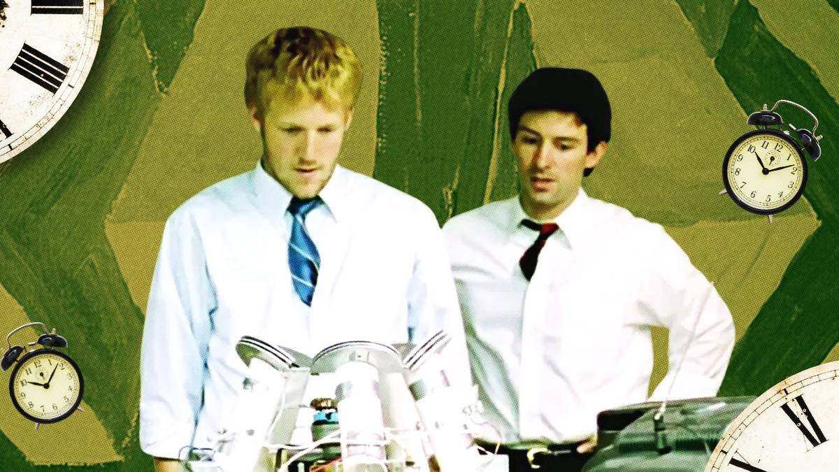 A custom image of David Sullivan and Shane Carruth from Primer, set against a trippy background with clocks