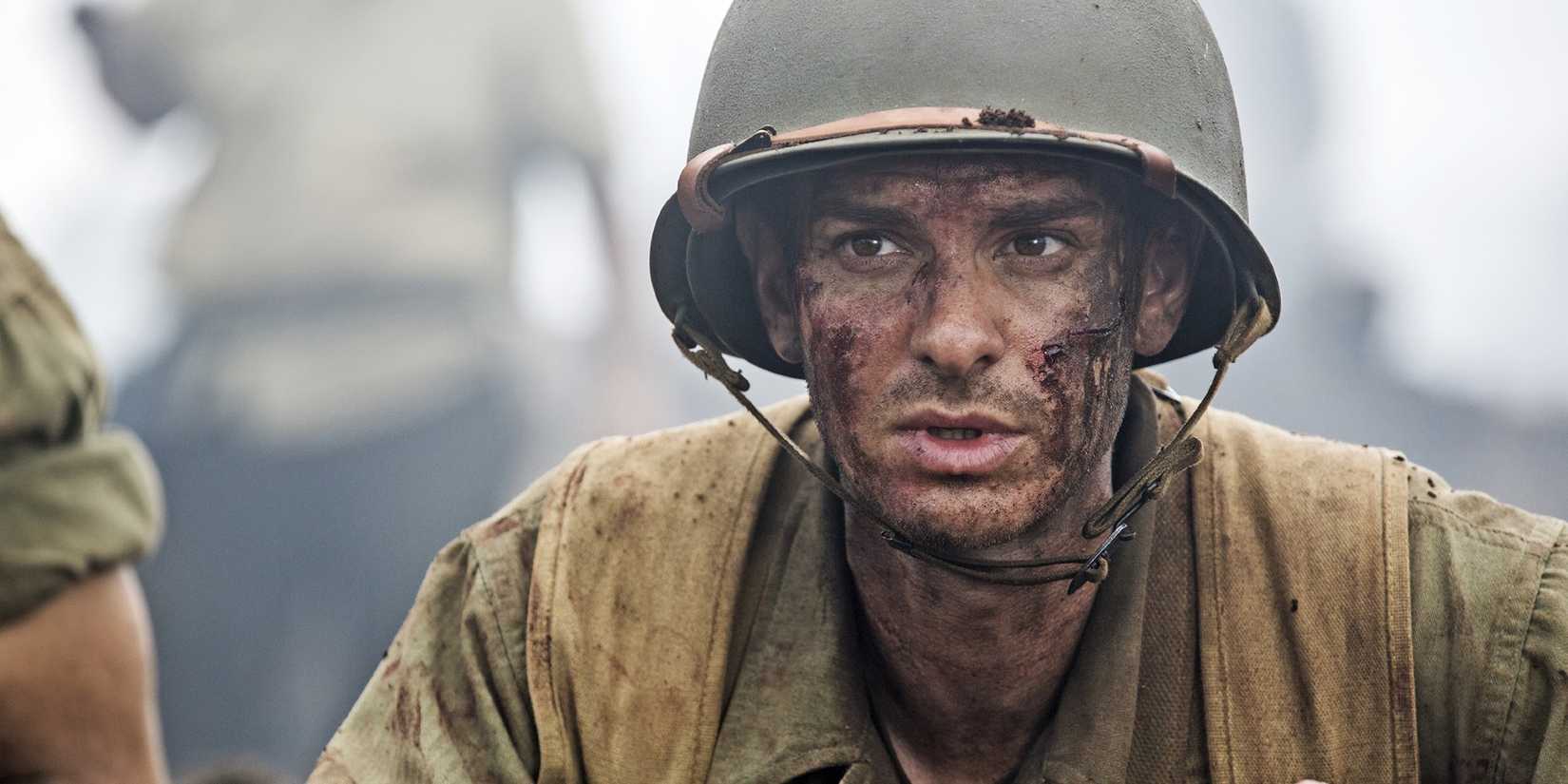 A bruised Desmond Doss (Andrew Garfield) on the battlefield in 'Hacksaw Ridge.'