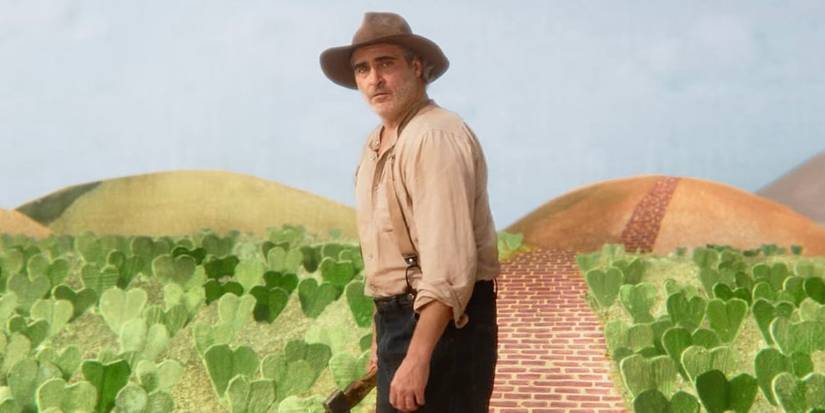 Joaquin Phoenix as Beau in front of a painted landscape in Beau is Afraid.
