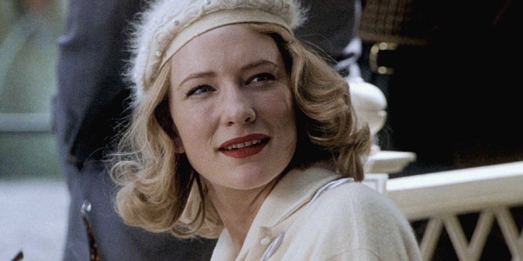 Meredith Logue smiling while she turns around in 'The Talented Mr. Ripley'