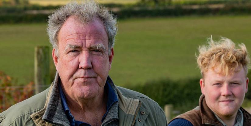 Jeremy Clarkson and a young man standing on a farm in Clarkson's Farm.