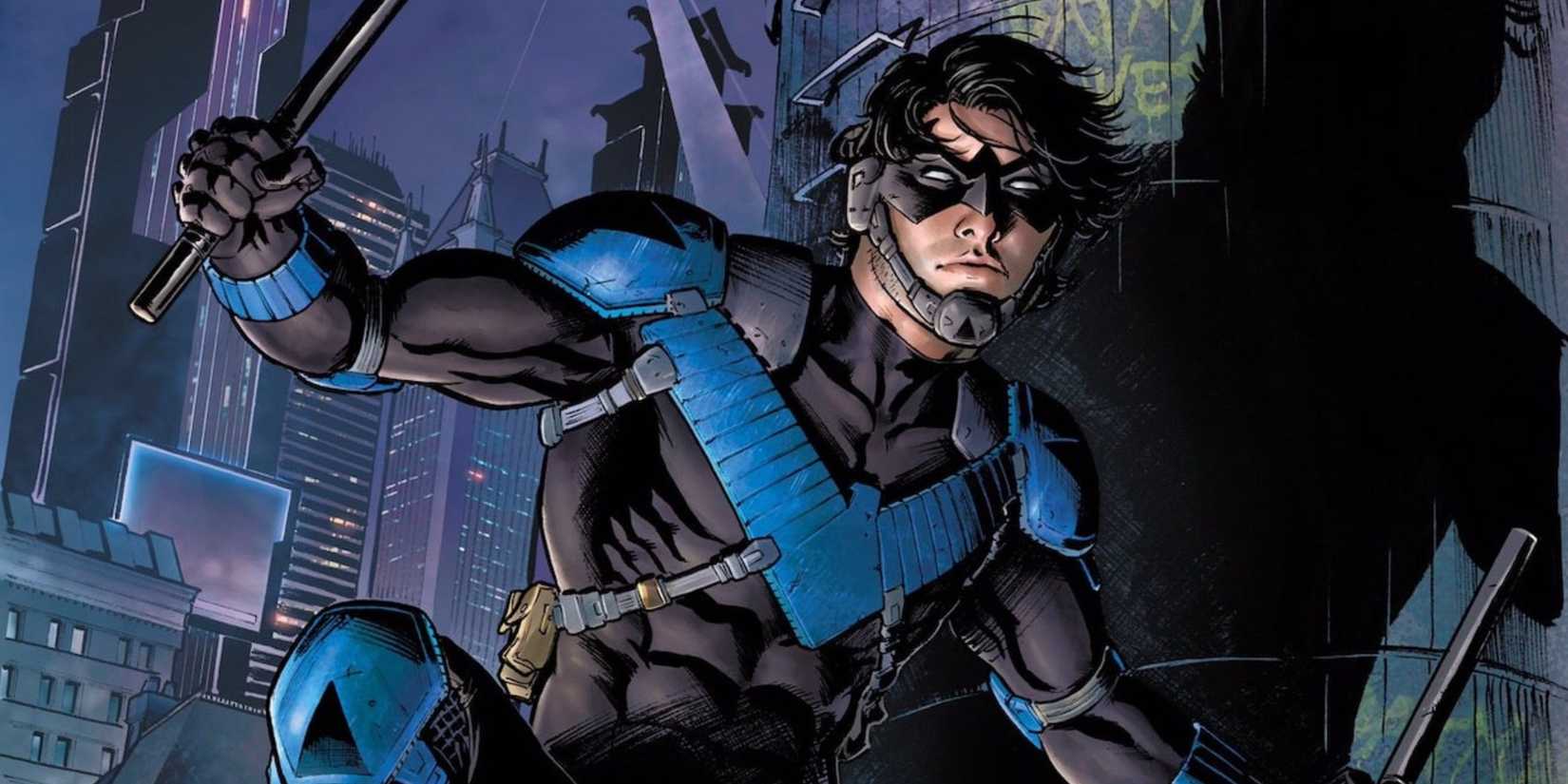 Nightwing crouching on a rooftop