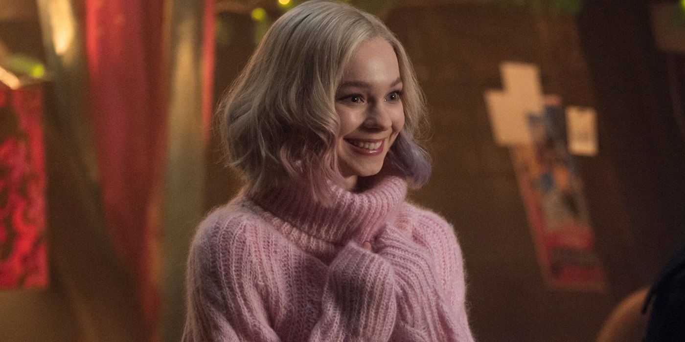 Emma Myers as Enid Sinclair smiling widely in Wednesday (2022)