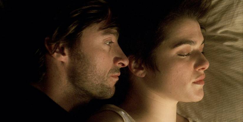 Hugh Jackman and Rachel Weisz lying in bed close to each other in The Fountain.