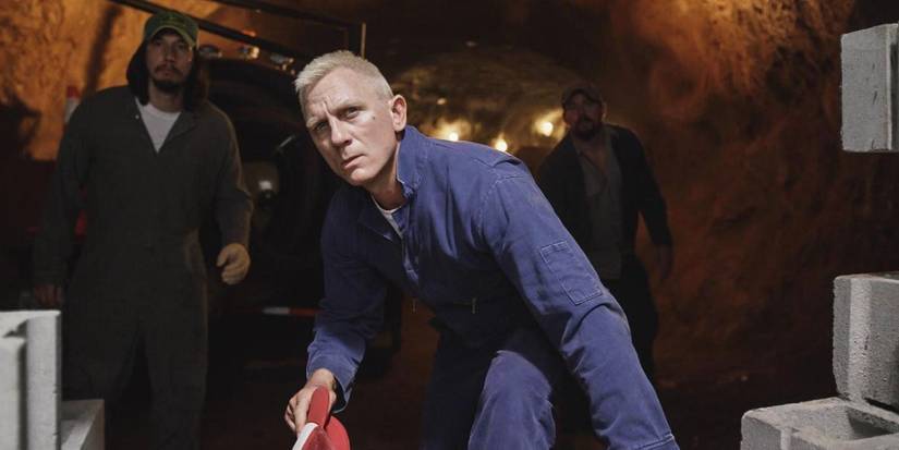 Adam Driver and Daniel Craig in a tunnel in Logan Lucky.