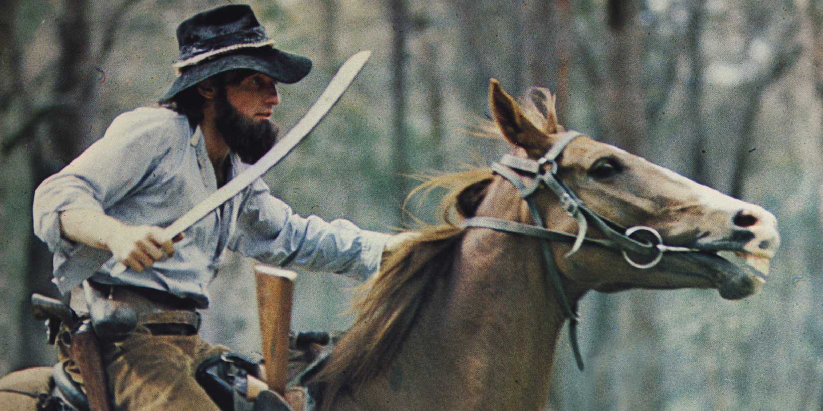  Dennis Hopper as Maniel Morgan riding a horse in Mad Dog Morgan