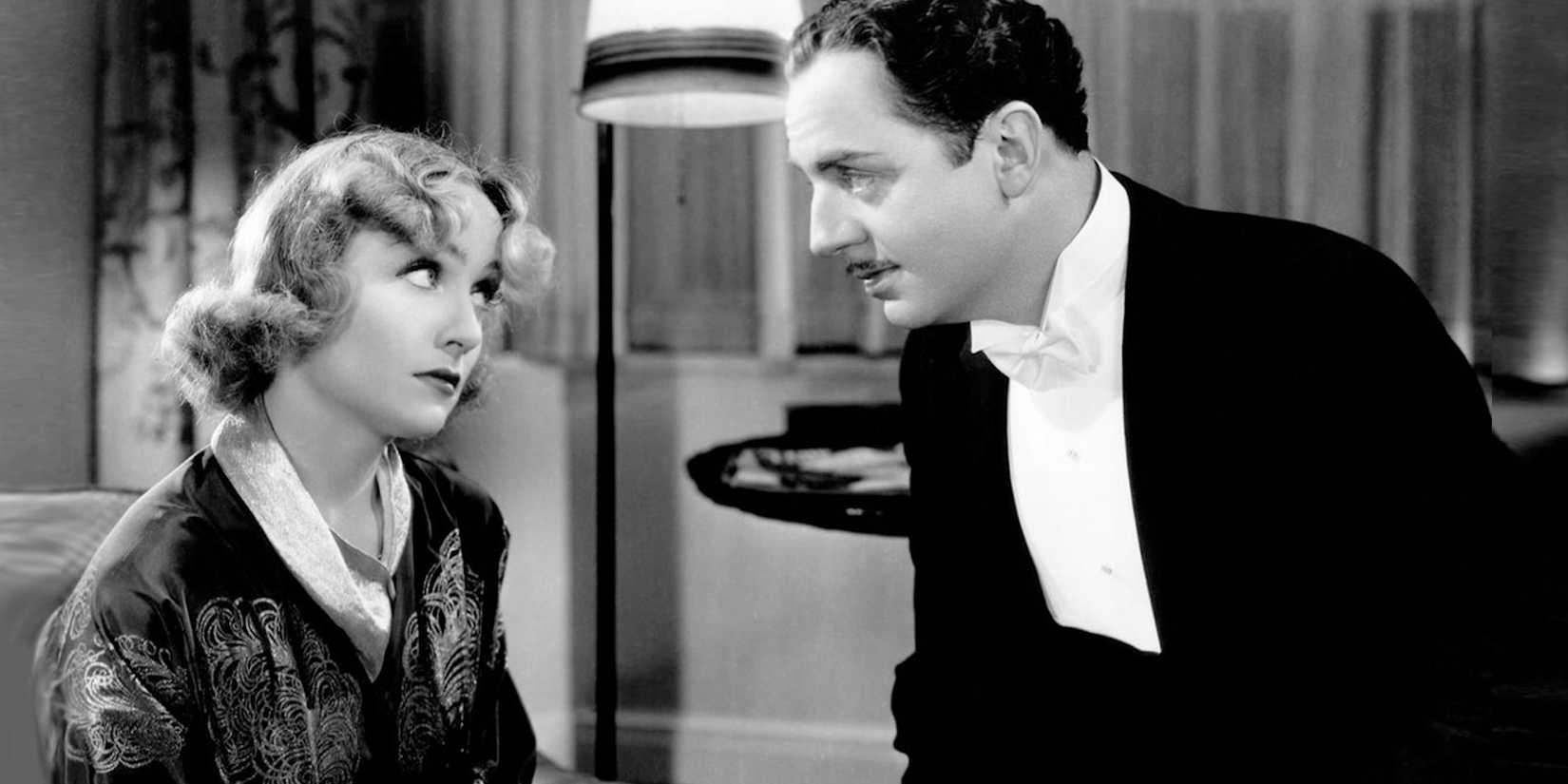 Carole Lombard as Irene Bullock and William Powell as Godrey Parks look at each other in My Man Godfrey.