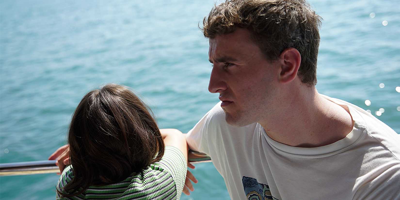 Paul Mescal looking out the water in 'Aftersun'