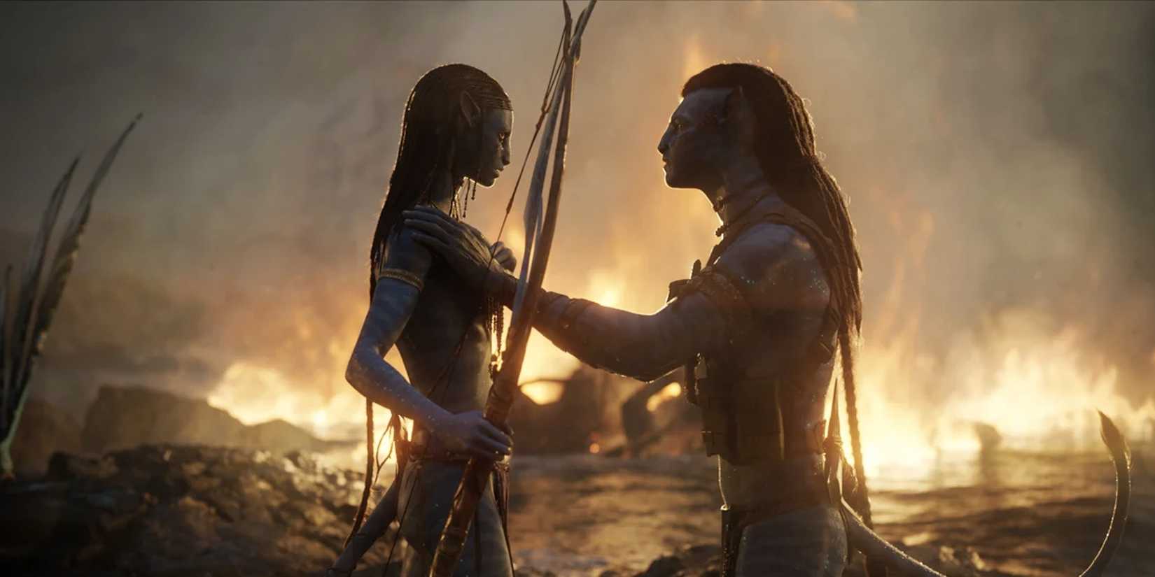 Jake and Neytiri embracing at sunset in Avatar: The Way of Water