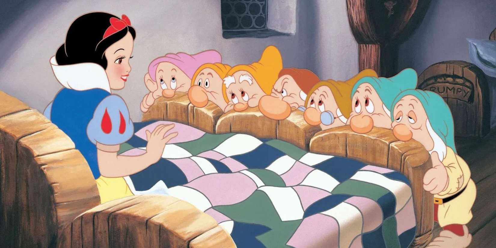 The seven dwarfs watching Snow White wake up in Snow White and the Seven Dwarfs.