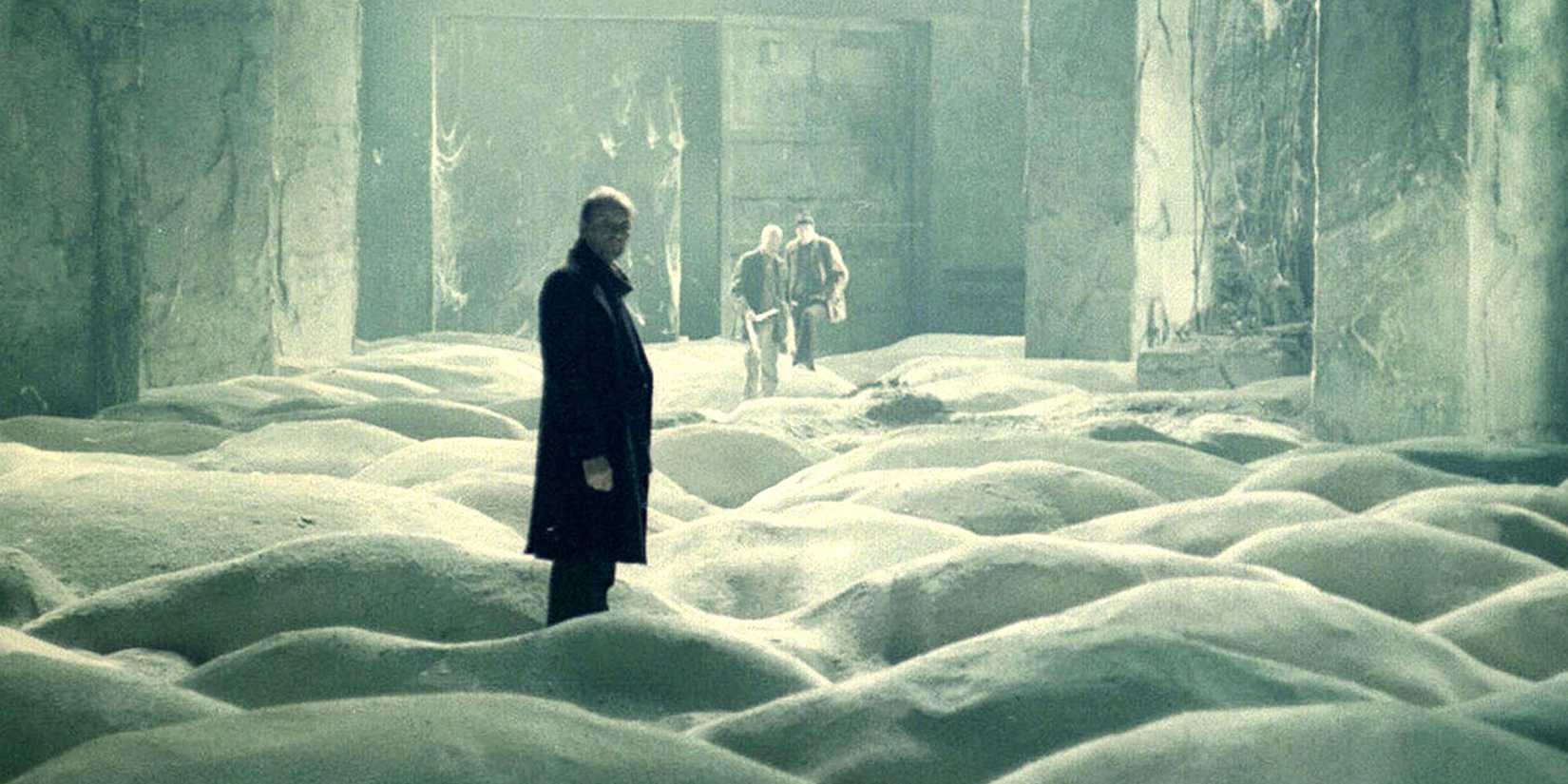 A man standing in a wide space in Stalker