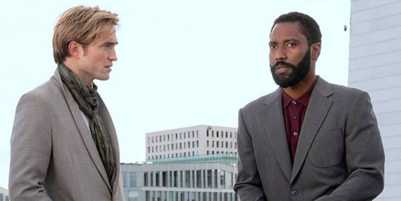 The Protagonist, played by John David Washington, standing next to Neil, played by Robert Pattinson in 'Tenet.'