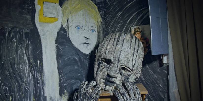A creepy figure pressed against the wall in The Wolf House - 2018