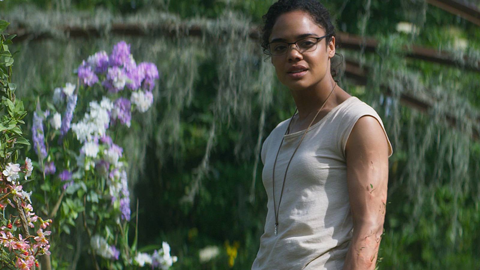 Tessa Thompson surrounded by flowers in 'Annihilation'