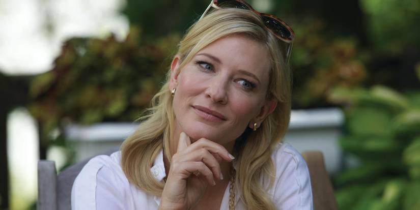 Jasmine French smiling at someone off-camera in Blue Jasmine