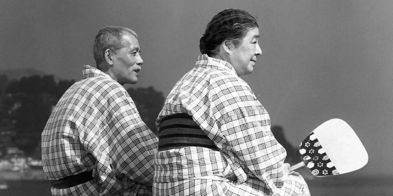 Chieko Higashiyama and Chishû Ryû as Shukichi Hirayama and Tomi Hirayama in Tokyo Story, sitting side by side