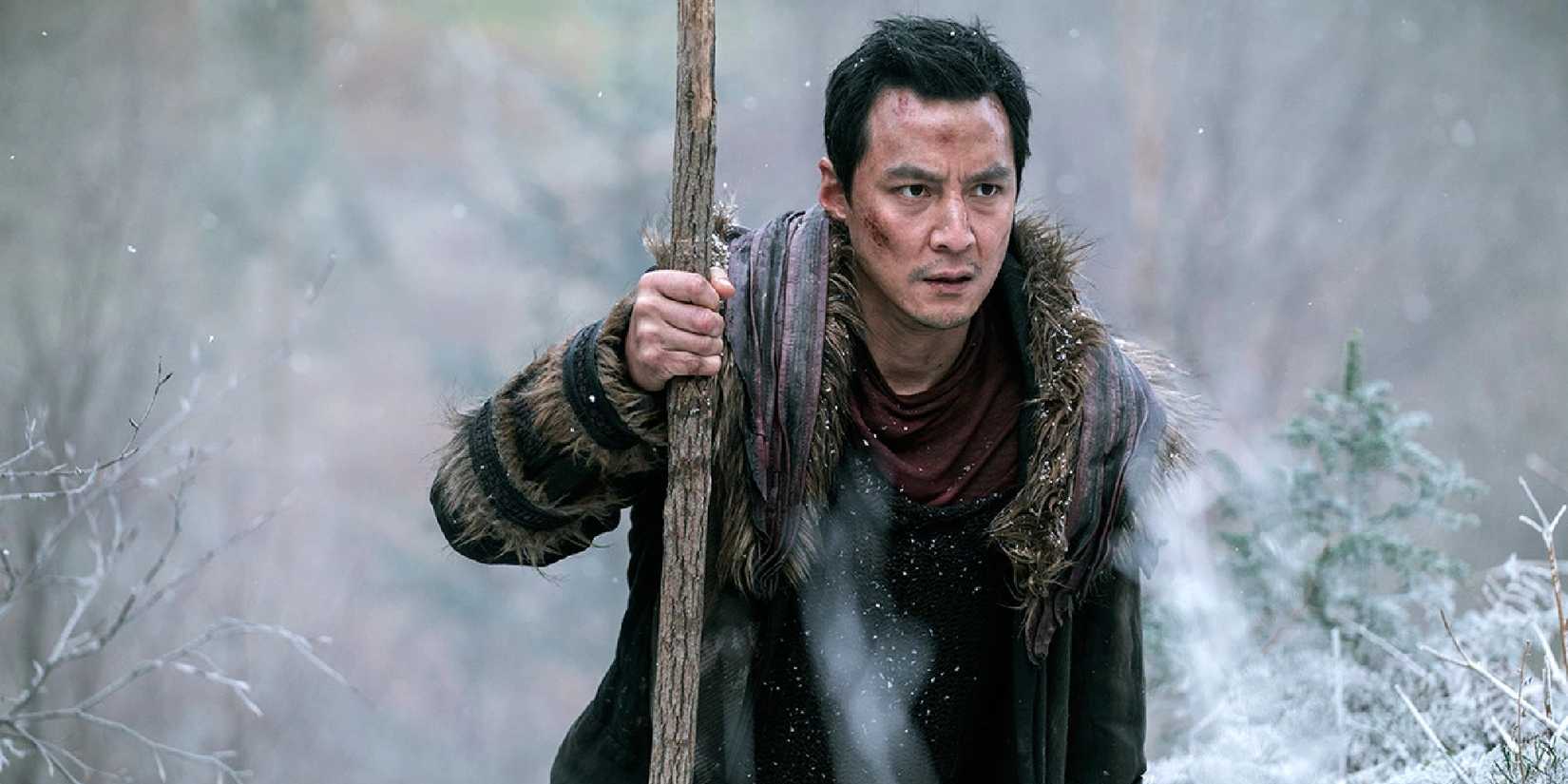 Daniel Wu walking through a snowy tundra in 'Into the Badlands'.